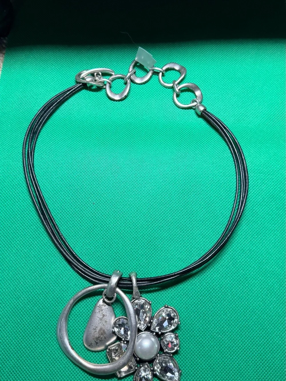 Silver Flower Pendant Necklace with Black Cord and Clear Accents